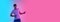 Young caucasian man`s portrait on gradient blue-pink studio background in neon light