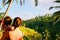 Young caucasian mother and her two years old kid enjoying the views at Tegallalang rice terraces,  Gianyar Regency, Bali.