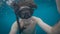 A young caucasian snorkeling man underwater selfie.