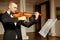 Young caucasian violinist perform music in music conservatory