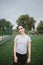 Young caucasian woman portrait workout does the sports on the playground