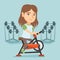 Young caucasian woman riding stationary bicycle.