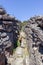 Young caucasian women is hiking on the way to the pinnacle lookout, The Central Grampians, Victoria, Australia