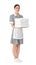 Young chambermaid holding stack of towels on white background