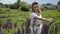 Young charming girl with wildflowers lupins