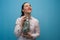 Young charming woman holds a jar