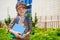 Young cheerful schoolboy with books