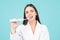 Young cheerful woman brushing teeth with toothbrush during morning hygiene procedures isolated background, facial