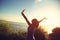 Young cheering woman open arms