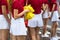 Young cheerleader group closeup with legs