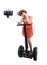 Young chic tourist woman taking selfie photo with mobile phone while riding on segway