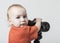 Young child with digital camera