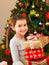 Young child holding gifts
