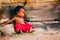 Young child looking alone in Cambodia