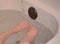 Young child\'s feet in bathtub