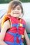 Young child wearing life vest