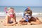Young children on beach holiday