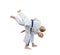 Young children are doing judo throws
