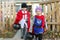 Young Children Leaving House After Trick-or-Treating