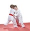 Young children are trained judo sparring in kindergarten