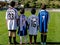 Young children wearing Football or Soccer kit