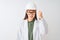 Young chinese engineer woman wearing coat helmet glasses over isolated white background angry and mad raising fist frustrated and