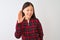 Young chinese woman wearing casual jacket standing over isolated white background Waiving saying hello happy and smiling, friendly