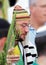 Young with citrus-etrog praying in Sukkot