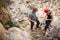 Young Climbers Checking Equipment