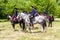 Young cossacks in traditional uniform on the horses