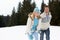 Young Couple In Alpine Snow Scene