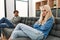 Young couple angry sitting on the sofa in silence at home