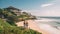 Young Couple On Bali Beach With Luxurious Houses In The Distance