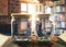 Young couple in big glass jars, loneliness concept