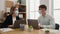 Young couple business workers wearing medical mask working at office