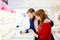 Young couple buying ring in jewelry store