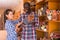 Young couple buys earthenware in a store