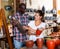 Young couple buys earthenware in a store