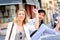 Young couple calling taxi in the street