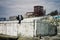 Young couple chatting and talking on the seafront of the desert ex soviet town