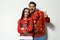 Young couple in Christmas sweaters