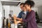 Young couple cooking italian pasta