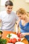 Young couple cooking together