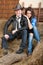 Young couple cowboys on the hay