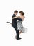 Young couple dancing the tango, white background