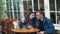 A young couple Denim clothes On a date in a vintage restaurant outside They are talking