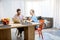 Young couple dinning in the living room