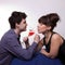 Young couple drinking rose wine