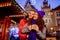 Young couple with drinks on Christmas market