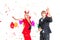 Young couple enjoy dance with colorful confetti in new year celebration party